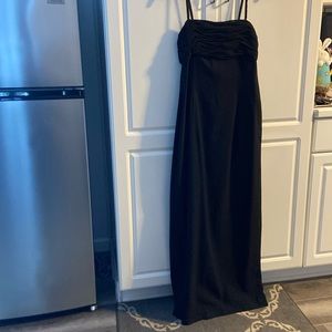 AJ Bari black gown back has two sheer  panels with slit up the back size 12